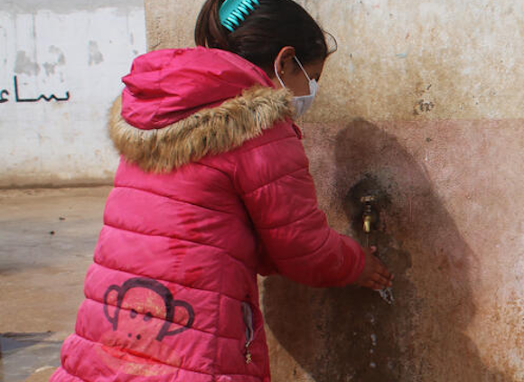 Karma*, 9 washing her hands. Image credit: GMU