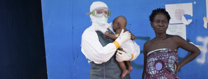 Jojo*, a young child who survived the 2014-2015 Ebola outbreak in Liberia, was cared for by health workers and her mother (right), also an Ebola survivor who was allowed to stay in the unit to care for her daughter.