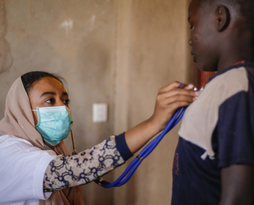 Dr Omnia conducts health screening in a religious school in Khartoum state, Sudan. Image credit: Mohammed Osman & Abubaker Garelnabei / Save the Children