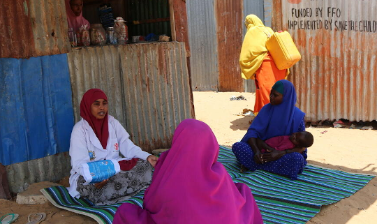 Community health workers raise public awareness in Mogadishu of prevention and management of COVID-19. Image credit: Save the Children Somalia