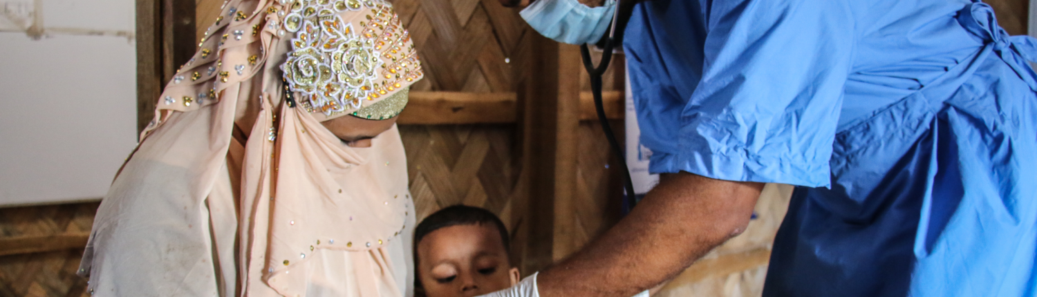 Solema* (22) and her son Sayeed (3) receive treatment at Save the Children's health facility in the Rohingya refugee camps. Image credit: Sonali Chakma / Save the Children